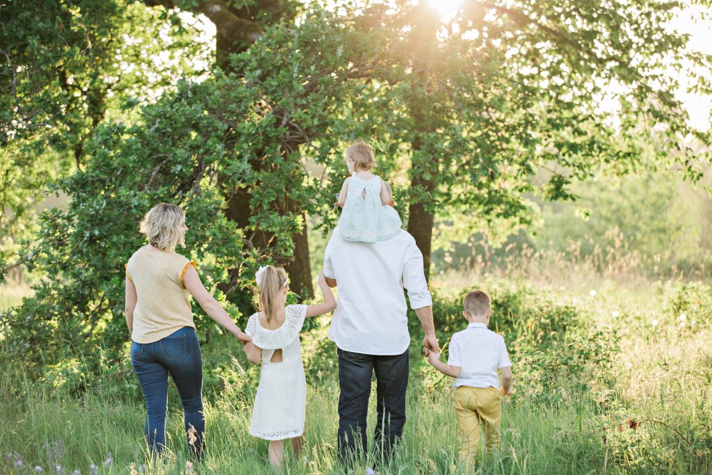 happy family walking with kids in the forest. Forced Retirement