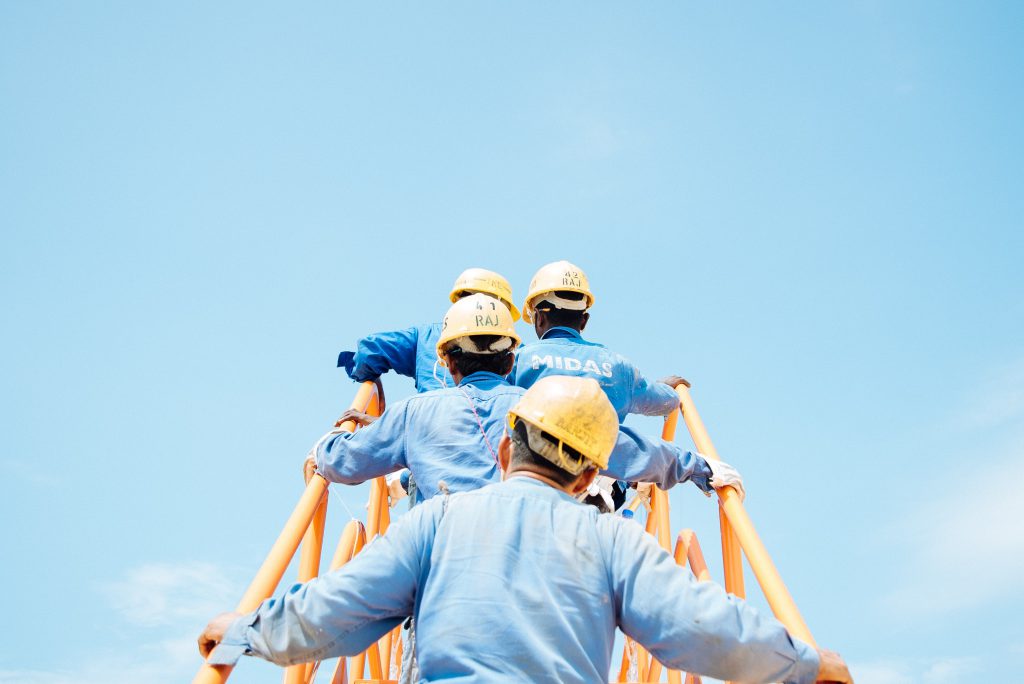 workers going up the stairs. Workers Compensation Guide